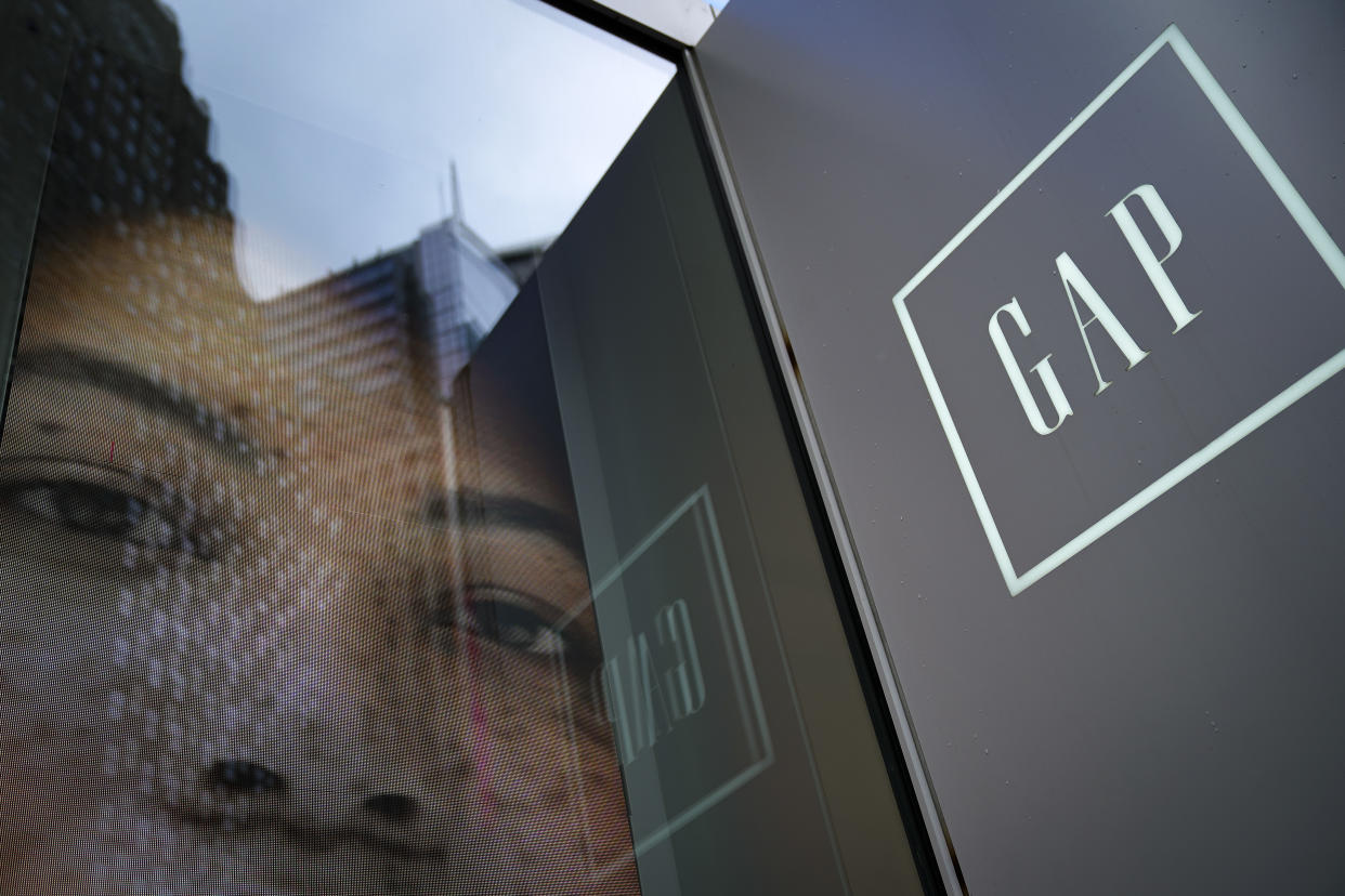 NEW YORK, NY - MARCH 01: Signage for a GAP store stands near the entrance to a store in Times Square, March 1, 2019 in New York City. On Thursday, Gap Inc. announced plans to separate into two publicly traded companies, spinning off Old Navy into a separate firm as it closes about 230 Gap stores over the next two years. According to Gap Inc., Old Navy will become its own company, and the other company, which has not been named yet, will consist of the Gap brand, Athleta, Banana Republic, Intermix and Hill City. (Photo by Drew Angerer/Getty Images)