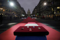 A coffin carrying soils from the U.S., France and Monaco will be deposited inside the Pantheon monument, rear, in Paris, France, Tuesday, Nov. 30, 2021, where Josephine Baker is to symbolically be inducted, becoming the first Black woman to receive France's highest honor. Her body will stay in Monaco at the request of her family. (AP Photo/Christophe Ena)