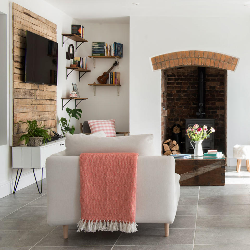 living room with vertical storage shelves