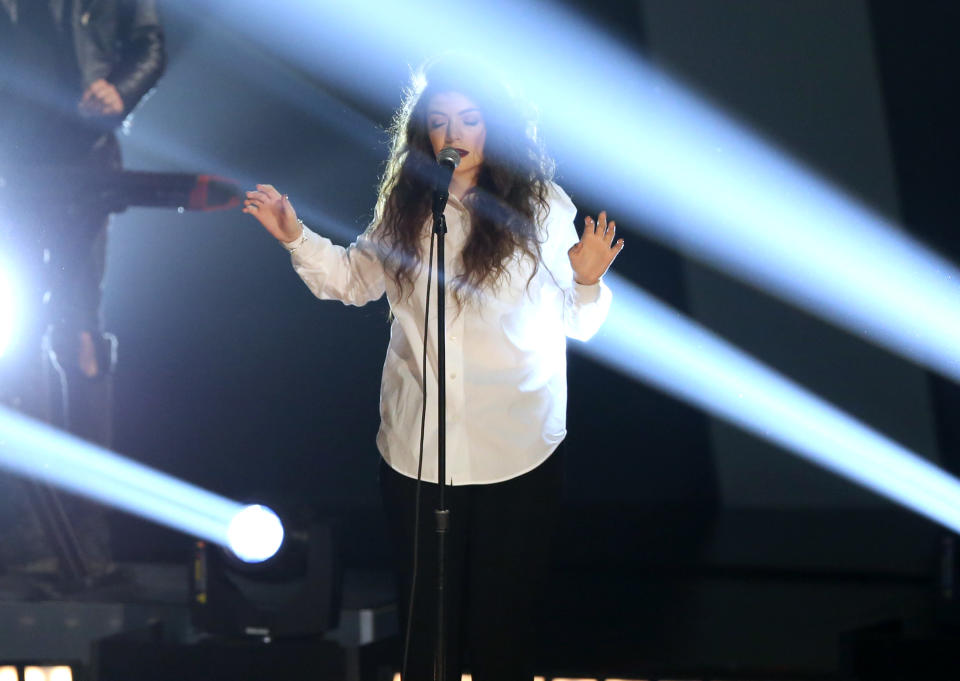 Lorde performs “Royals” at the Grammy Nominations Concert Live! on Friday, Dec. 6, 2013, at the Nokia Theatre L.A. Live in Los Angeles. (Photo by Matt Sayles/Invision/AP)