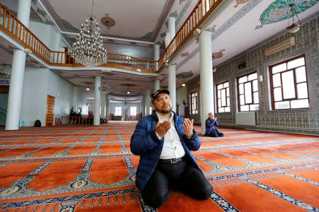 Qurbanjan Nourmuhammed prays at a mosque in Istanbul, Turkey, March 1, 2019. REUTERS/Murad Sezer