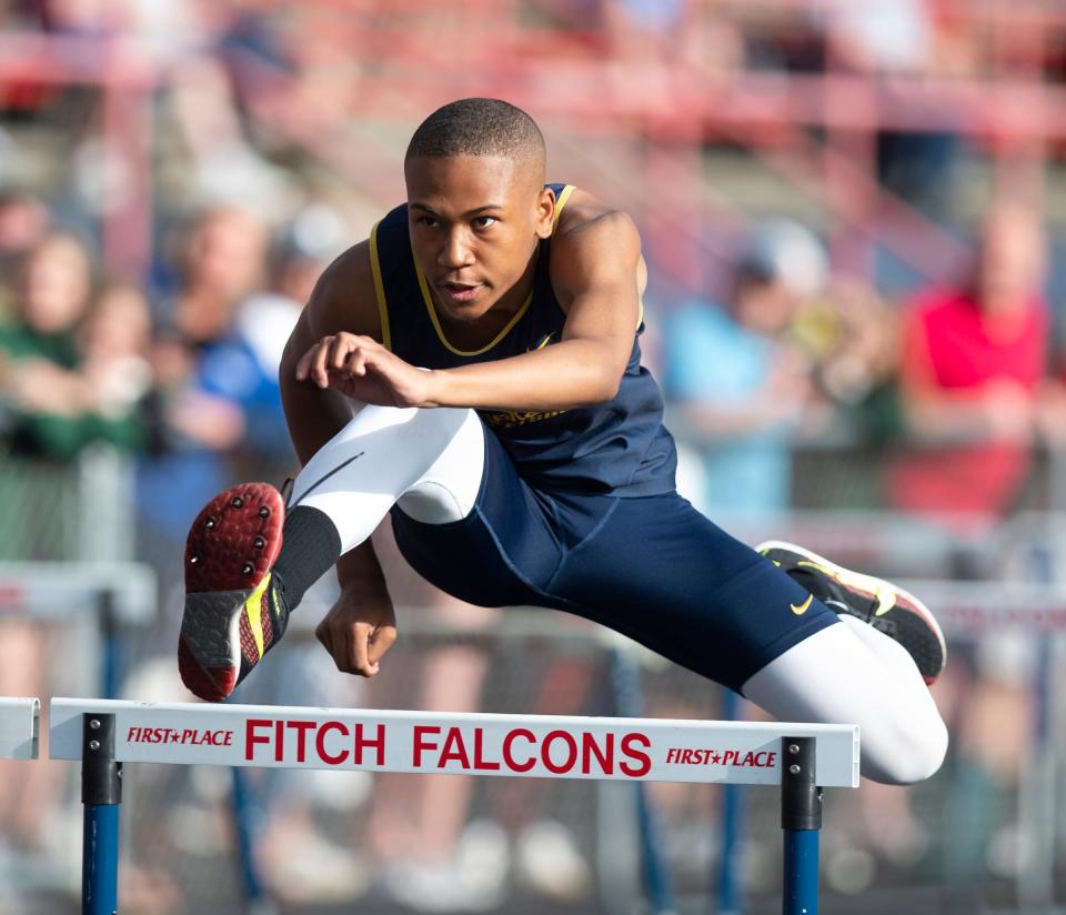 James Woods runs the 110 hurdles for Streetsboro during the 2022 track & field season.