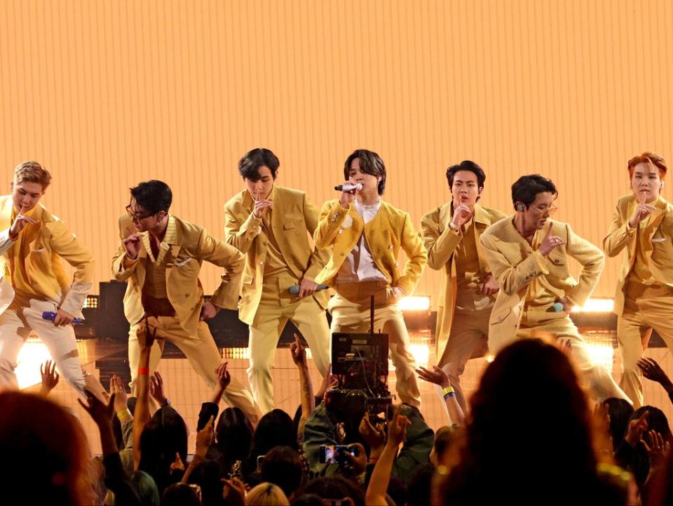 BTS performing onstage at the American Music Awards 2021 (Getty Images for MRC)