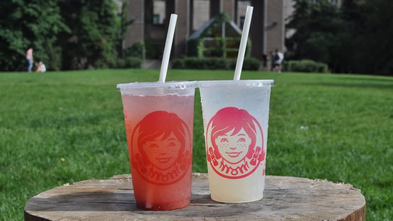Two Wendy's lemonades, one strawberry flavored