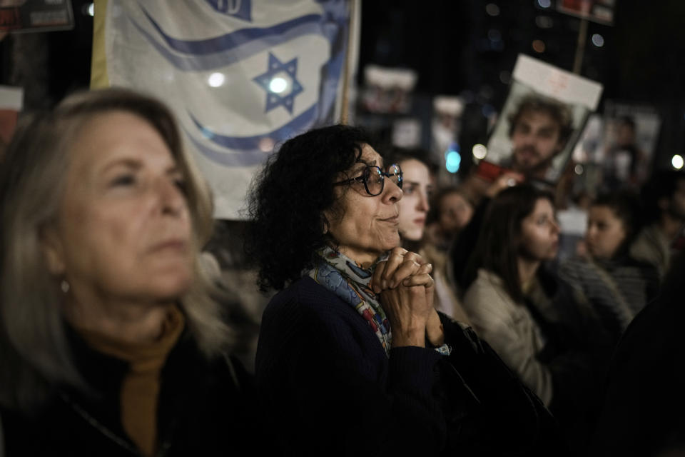 Families and supporters of Israeli hostages held by Hamas in Gaza attend a rally calling for their return, in Tel Aviv, Israel, Saturday, Dec. 16, 2023. More than 100 Israeli hostages are held in Gaza after being abducted in a Hamas cross-border attack on Oct. 7. (AP Photo/Leo Correa)