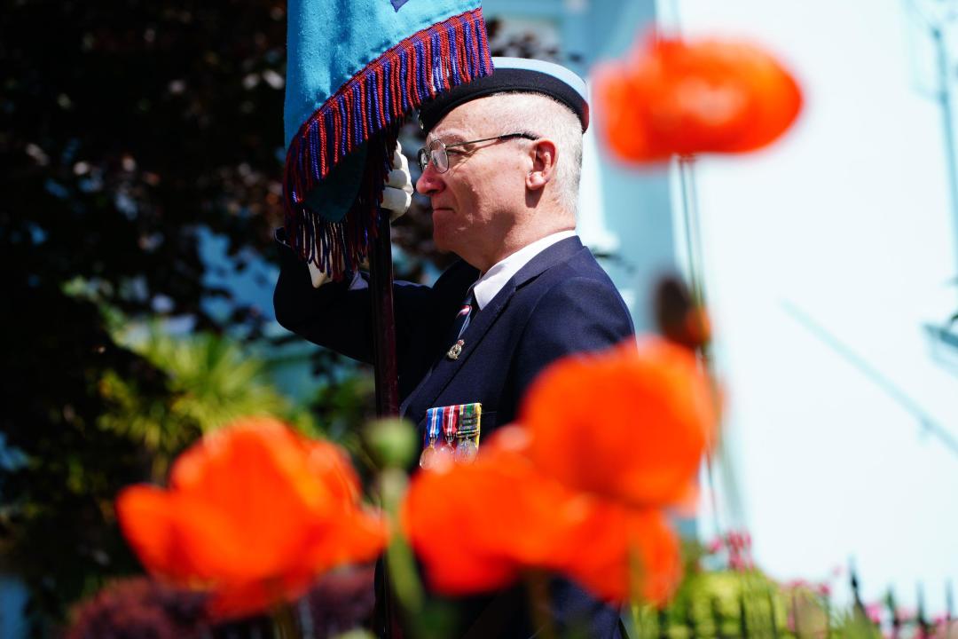 Veterans paid their respect in Falmouth. (PA)