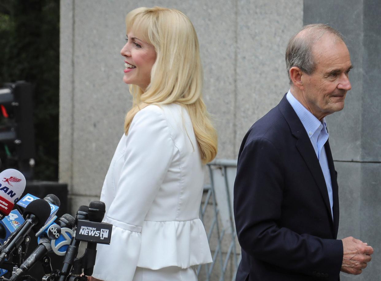 Law partners Sigrid McCawley and David Boies, representing accusers, talk to the media after a hearing in Manhattan in July 2019 about the arrest of financier Jeffrey Epstein on sex trafficking charges.
