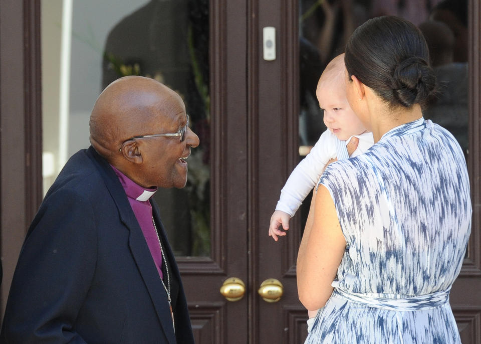 Britain's Duchess of Sussex Meghan, hold herbaby son Archie as they meet with Archbishop Desmond Tutu at the Tutu Legacy Foundation  in Cape Town on September 25, 2019. (Photo by HENK KRUGER / POOL / AFP)        (Photo credit should read HENK KRUGER/AFP via Getty Images)