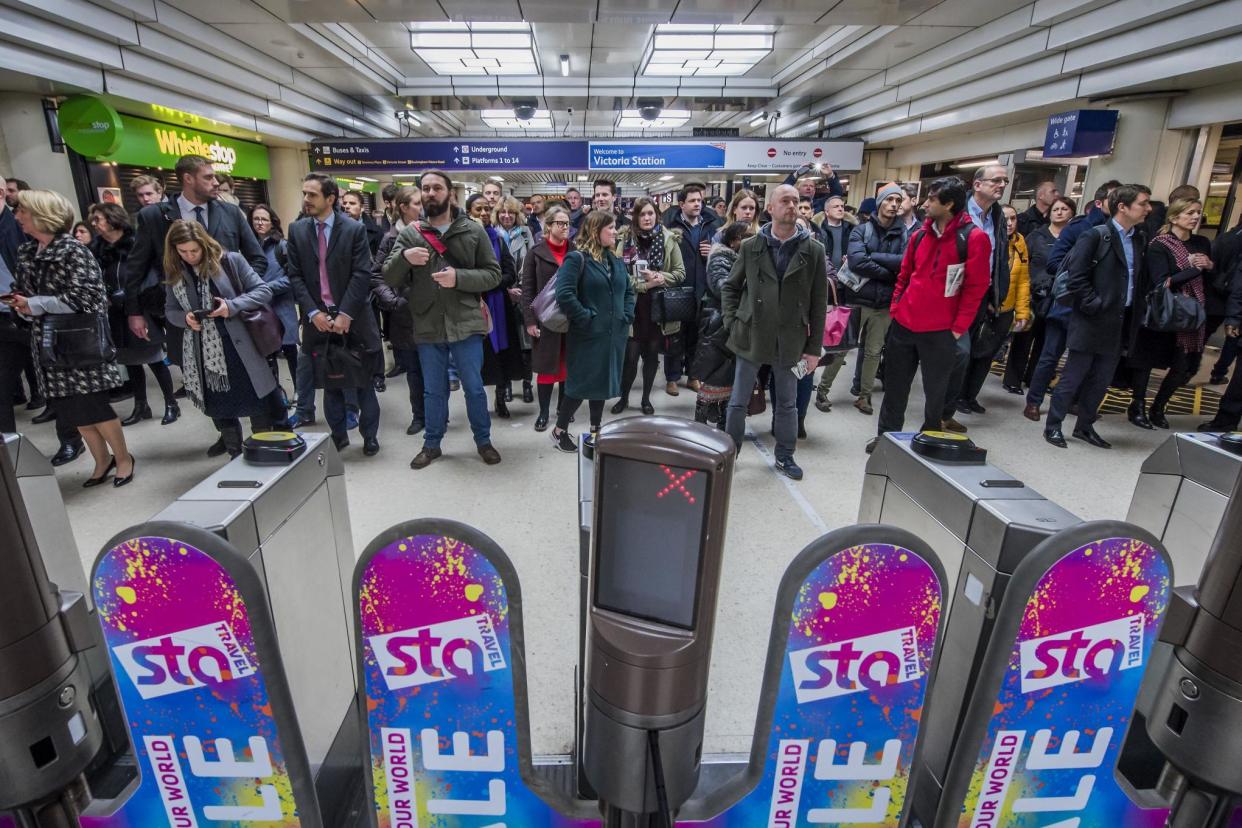 Passengers wait at Victoria during a Southern Rail strike: Rex Features