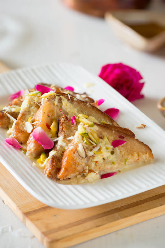 <p>My Tasty Curry</p><p>A delicious Indian bread pudding in which fried bread is soaked thick saffron flavoured reduced milk and topped with lots of nuts.</p><p><strong>Get the recipe here: <a href="https://mytastycurry.com/double-ka-meetha-hyderabadi-recipe" rel="nofollow noopener" target="_blank" data-ylk="slk:Shahi Tukda;elm:context_link;itc:0;sec:content-canvas" class="link ">Shahi Tukda</a></strong></p>