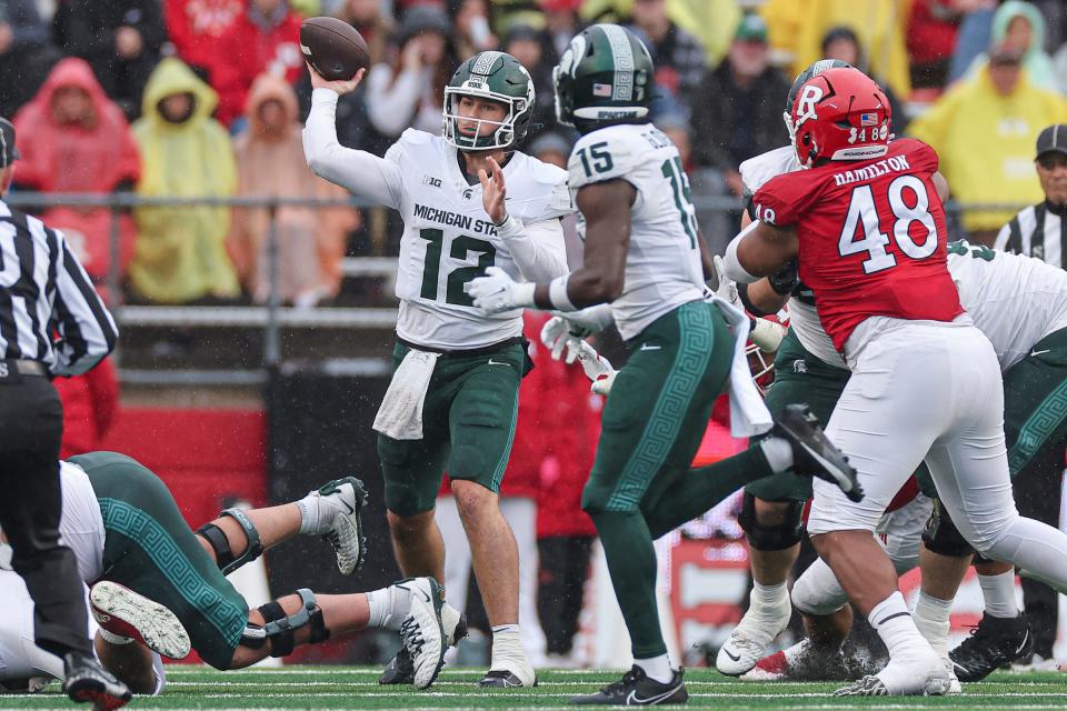 Michigan State quarterback Katin Houser throws the ball against Rutgers during the first half at SHI Stadium on Oct. 14, 2023 in Piscataway, New Jersey.