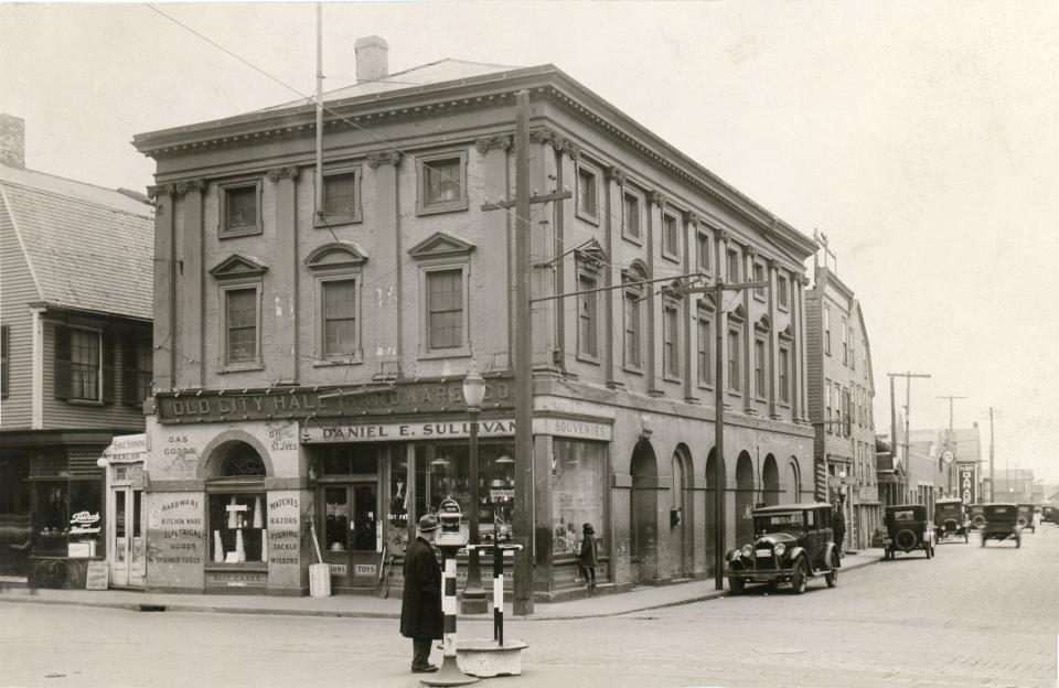 The historic Brick Market building has lived many lives over the centuries. In this photo from April 13, 1927, it was home to the Old City Hall Hardware Co.