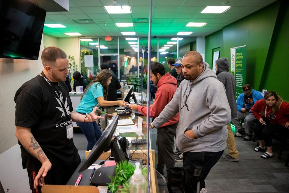 U.S. Army Vet Jamar Wilson buys THC products from the R. Greenleaf dispensary in Las Cruces, Friday, April 1, 2022. On April 1, the Land of Enchantment became the 18th state to regulate retail cannabis, and several stores in Las Cruces celebrated the historical date by opening their doors at 12:01 a.m.