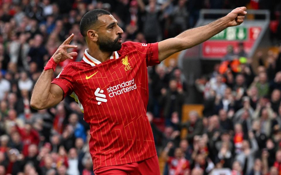 Mohamed Salah celebrates scoring for Liverpool against Brentford