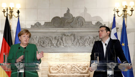 Greek Prime Minister Alexis Tsipras and German Chancellor Angela Merkel hold a joint news conference at the Maximos Mansion in Athens, Greece, January 10, 2019. REUTERS/Costas Baltas