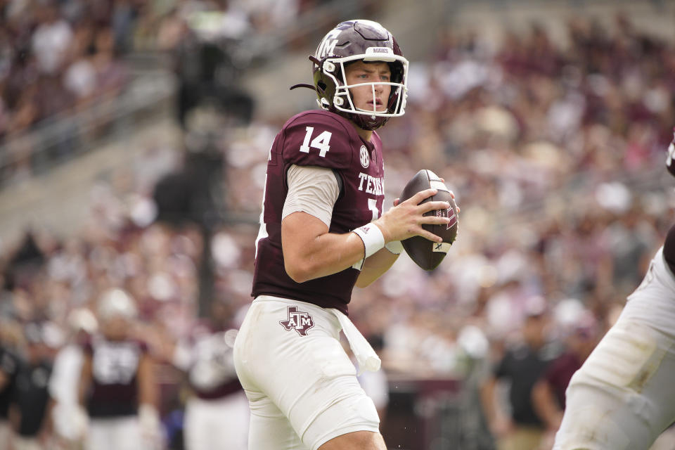 Oct 28, 2023; College Station, Texas, USA; Texas A&M Aggies quarterback Max Johnson (14) looks to pass against South Carolina Gamecocks during the second half at Kyle Field. Mandatory Credit: Dustin Safranek-USA TODAY Sports