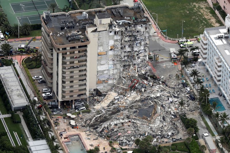 An aerial view showing a partially collapsed building in Surfside near Miami Beach