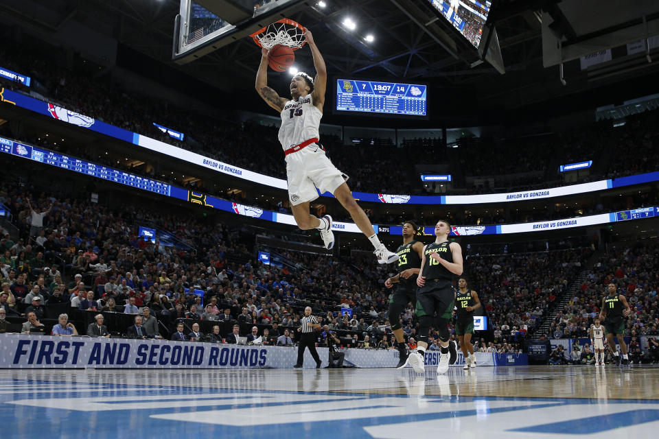 <p>Brandon Clarke #15 of the Gonzaga Bulldogs dunks the ball against the Baylor Bears during their game in the Second Round of the NCAA Basketball Tournament at Vivint Smart Home Arena on March 23, 2019 in Salt Lake City, Utah. (Photo by Tom Pennington/Getty Images) </p>