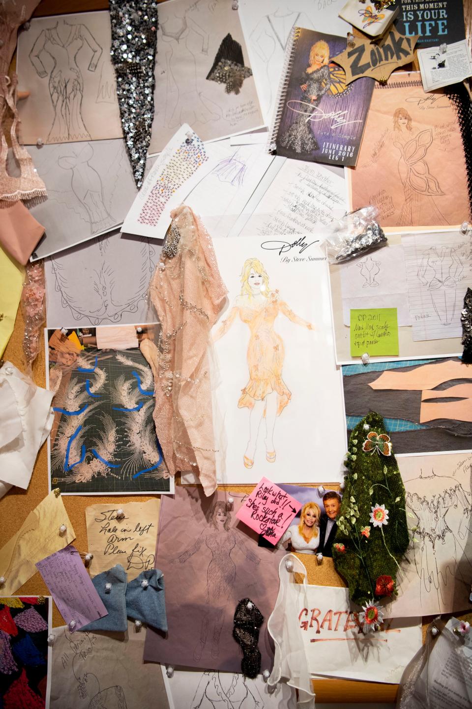 The wall near the work station display showing designs and sample material as part of Dolly Parton's wardrobe exhibition tied to her book "My Life In Seams"at Lipscomb University Beaman Library in Nashville, Tenn., Wednesday, Oct. 25, 2023.