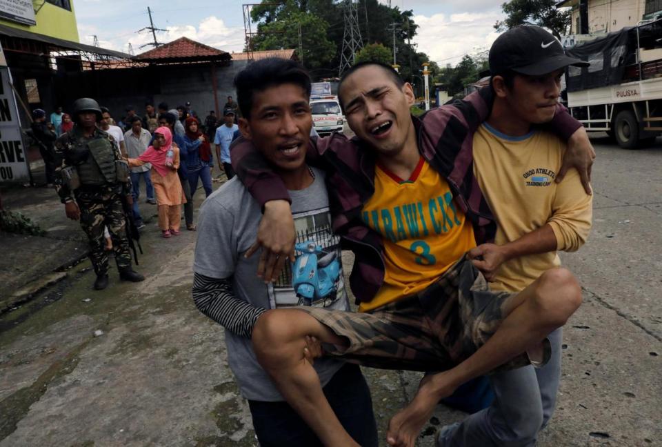 Thousands of people have fled Marawi as violence rages (Reuters)