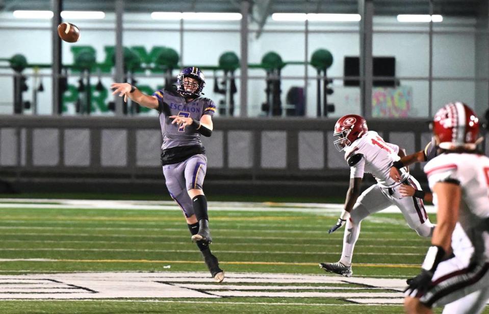 Escalon quarterback Donovan Rozevink makes a pass on the run during the Sac-Joaquin Section Division IV championship game with Patterson at St. Mary’s High School in Stockton, Calif., Friday, Nov. 24, 2023.