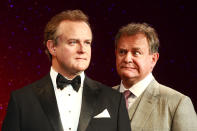 LONDON, UNITED KINGDOM - AUGUST 12: Hugh Bonneville Actor Hugh Bonneville attends a photocall to unveil his new Wax Figure at Madame Tussauds on August 12, 2014 in London, England. (Photo by Fred Duval/FilmMagic)