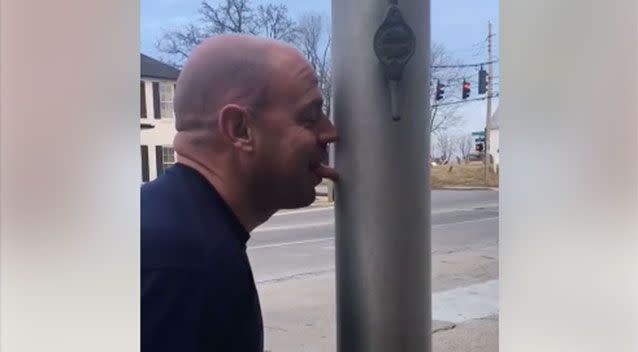 A fire fighter in Kentucky, US, went to extreme lengths for a free lunch, dared to stick his tongue to a frozen flag pole. Source: Kevin J Culver/Facebook