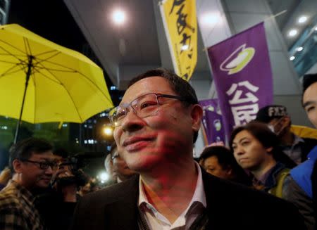 Benny Tai walks into the police headquarters in Hong Kong, March 27, 2017. REUTERS/Bobby Yip/Files