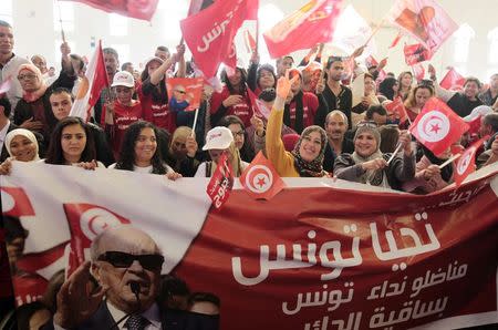 Supporters of Beji Caid Essebsi, presidential candidate and leader of Tunisia’s secular Nidaa Tounes party, attend a campaign event in Sfax November 20, 2014. REUTERS/Anis Mili