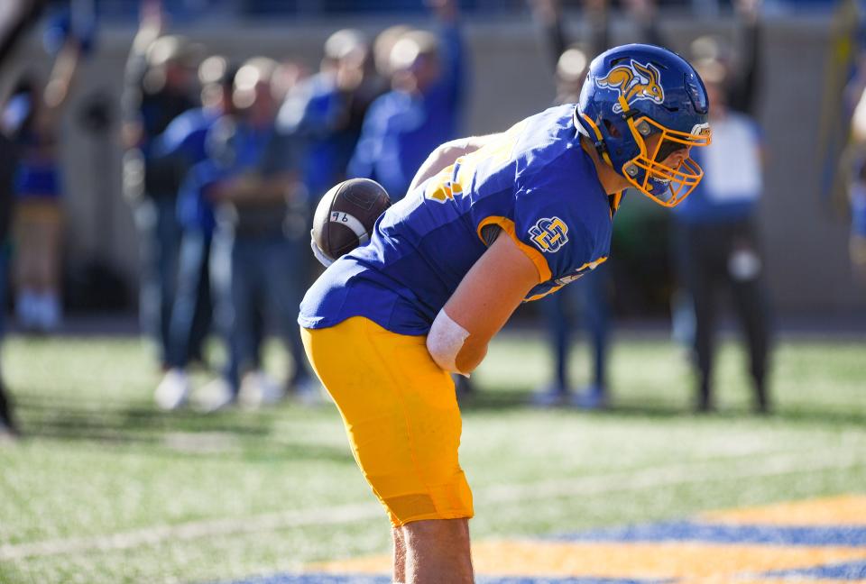 South Dakota State's Tucker Kraft takes a bow after a trick play that turned into a touchdown in the annual Dakota Marker game on Saturday, November 6, 2021 at Dana J. Dykhouse Stadium in Brookings.