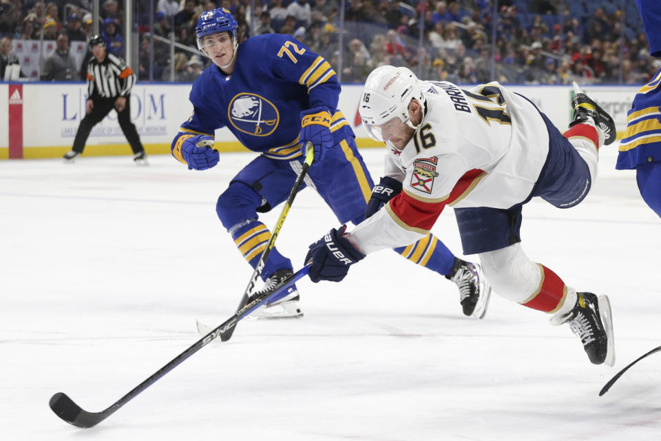 Florida Panthers center Aleksander Barkov (16) jumps as he shoots during the second period of an NHL hockey game against the Buffalo Sabres on Monday, Jan. 16, 2023, in Buffalo, N.Y. (AP Photo/Joshua Bessex)