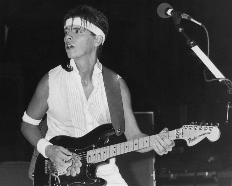 Andy Taylor performing with Duran Duran in 1983. (Photo: Dave Hogan/Hulton Archive/Getty Images)