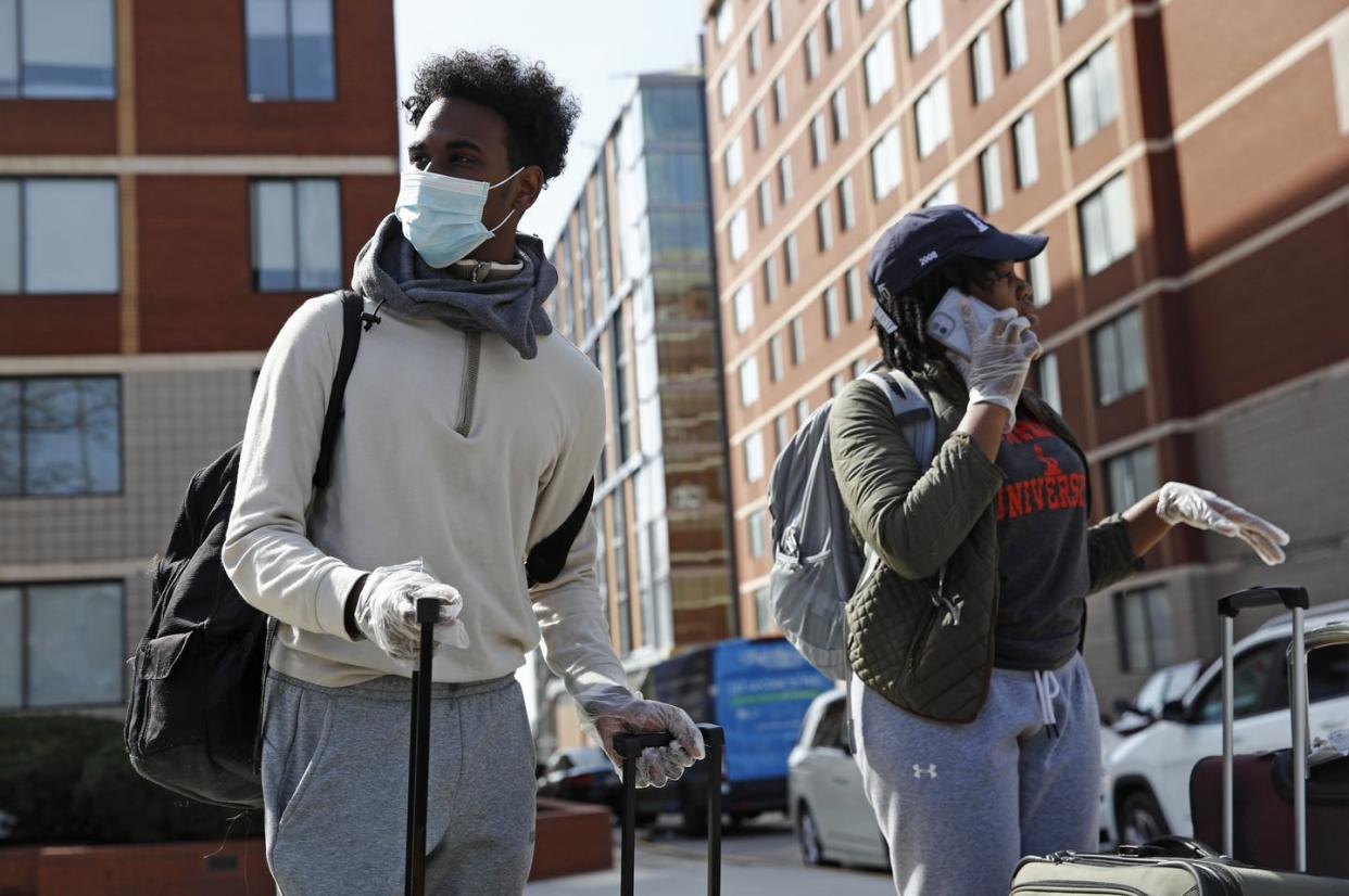 <span class="caption">Howard University students moving out of dorms in Washington.</span> <span class="attribution"><a class="link " href="http://www.apimages.com/metadata/Index/Virus-Outbreak-Washington-Daily-Life/91b2604378954143afc91b4eab6436cc/6/0" rel="nofollow noopener" target="_blank" data-ylk="slk:Patrick Semansky/AP Photo;elm:context_link;itc:0;sec:content-canvas">Patrick Semansky/AP Photo</a></span>