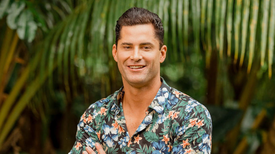 Bachelor in Paradise star Jamie Doran on the show in 2020 wearing a floral shirt