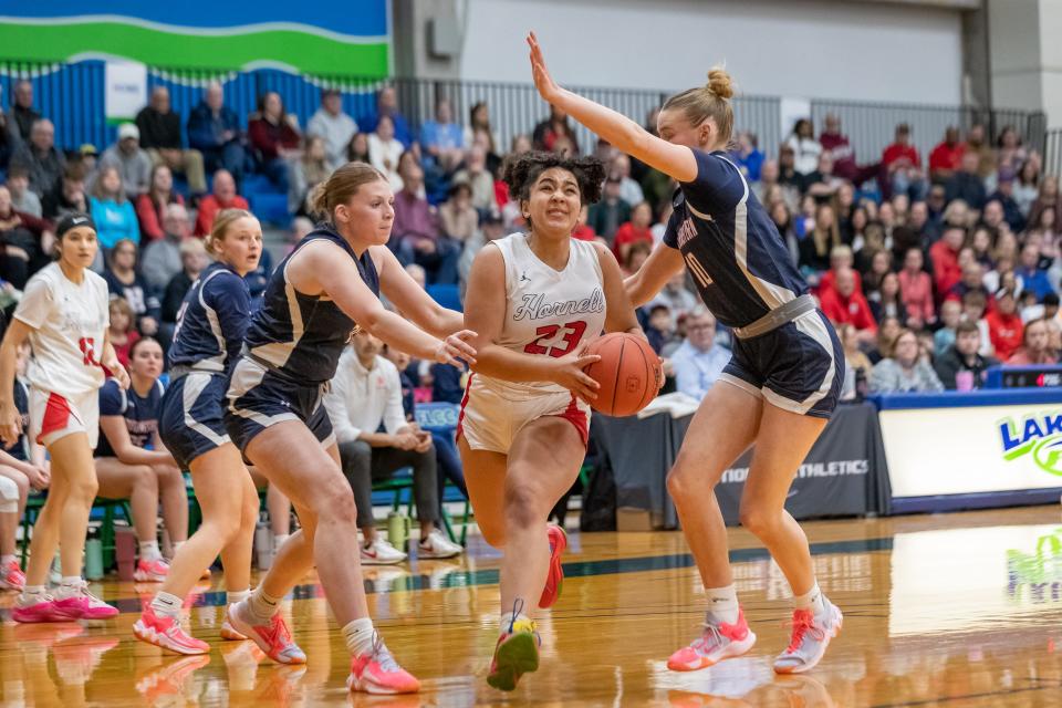 Hornell senior Kadience Gollnitz powers through the Southwestern defense during Saturday's Far West Regional matchup with Southwestern at FLCC. Southwestern edged the Red Raiders, 63-61.