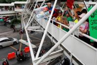 Environmental activists participate in a Global Climate Strike near the Ministry of Natural Resources and Environment office in Bangkok