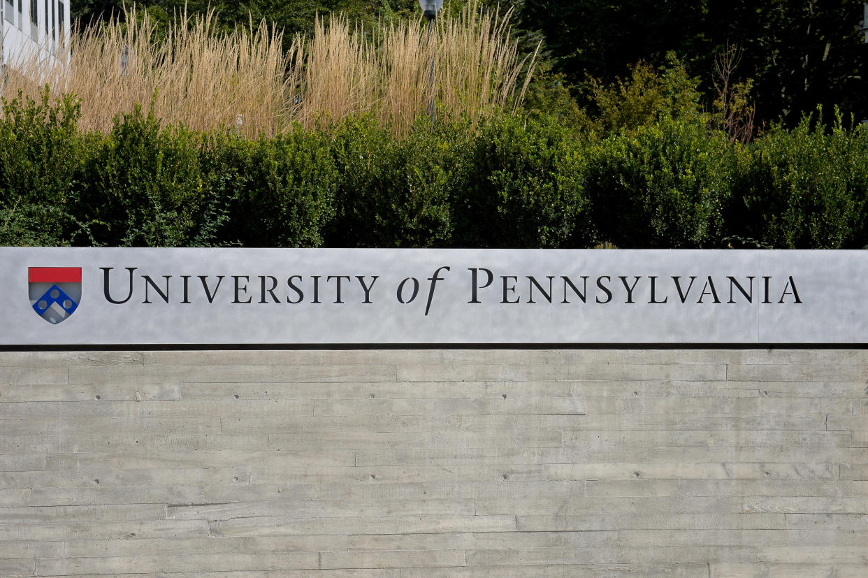 A university logo adorns a wall on the campus of the University of Pennsylvania in Philadelphia, Pennsylvania, U.S., September 25, 2017. REUTERS/Charles Mostoller