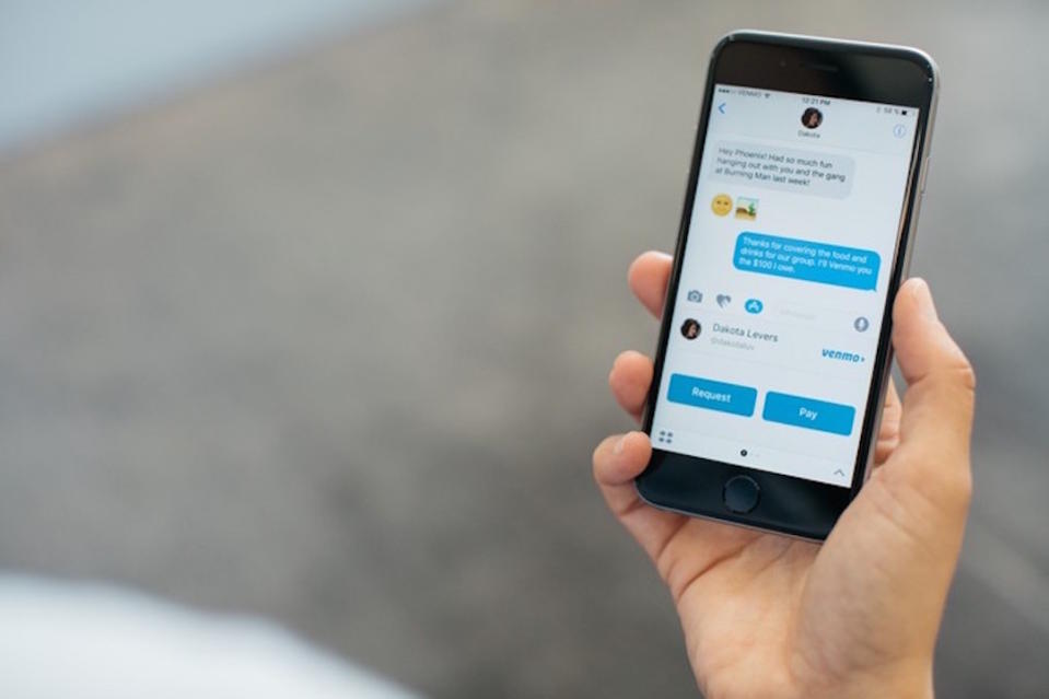 A person using Venmo messaging on a smartphone.