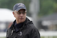 FILE - Trainer Todd Pletcher watches horses workout at Churchill Downs, May 3, 2022, in Louisville, Ky. Taiba is the 8-1 choice in the Breeders' Cup Classic horse race Saturday, Nov. 5, 2022, for embattled Hall of Fame trainer Bob Baffert, who makes his Kentucky return after serving a suspension this spring. Steve Asmussen hopes Epicenter provides his third Classic win, while Pletcher looks for his second with Life Is Good. (AP Photo/Charlie Riedel, File)