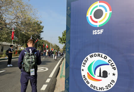 Athletes walk inside the Karni Singh Shooting Range, the venue of the ongoing International Shooting Sport Federation (ISSF) World Cup, in New Delhi, February 22, 2019. REUTERS/Anushree Fadnavis