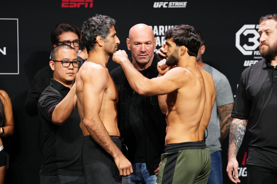 AUSTIN, TEXAS - DECEMBER 01: (L-R) Beneil Dariush of Iran and Arman Tsarukyan of Georgia face off during the UFC Fight Night ceremonial weigh-in at Moody Center on December 01, 2023 in Austin, Texas. (Photo by Josh Hedges/Zuffa LLC via Getty Images)