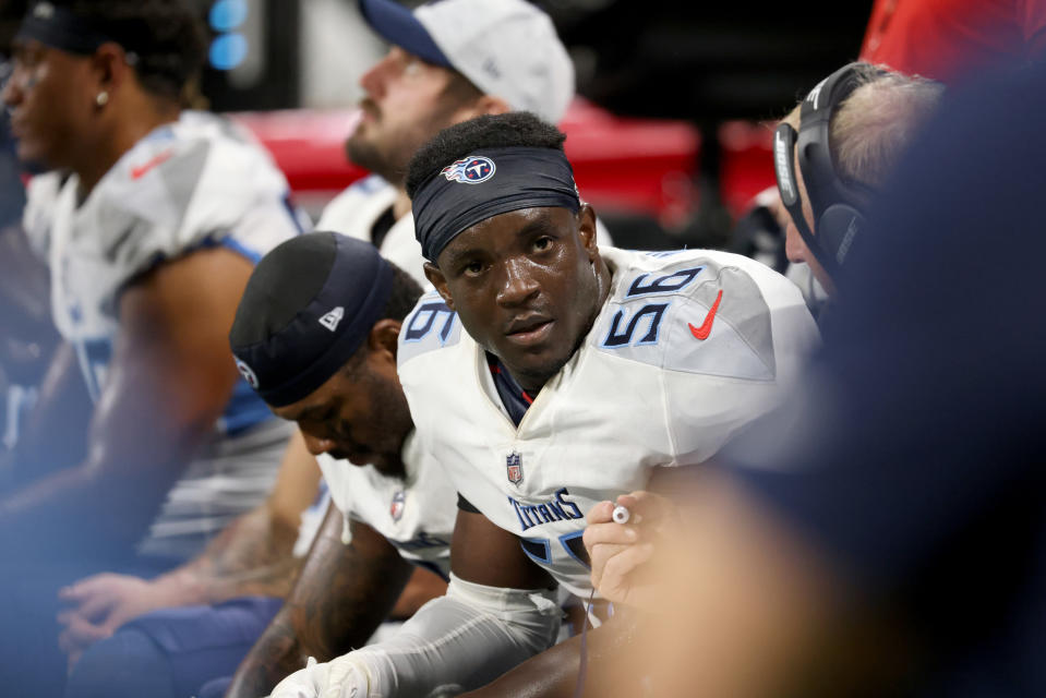 Aug 13, 2021; Atlanta, Georgia, USA; Tennessee Titans linebacker Monty Rice (56) talks to a coach on the sideline during their game against the Atlanta Falcons at Mercedes-Benz Stadium. Mandatory Credit: Jason Getz-USA TODAY Sports