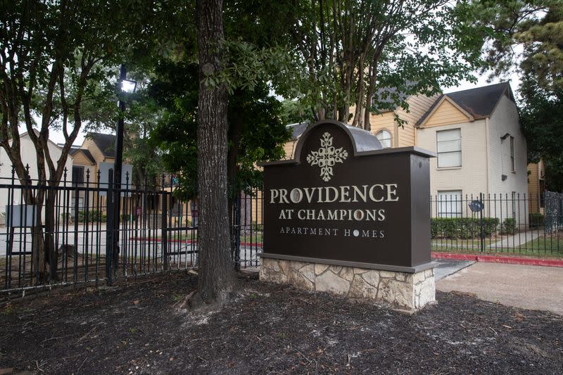 An entrance to the Providence at Champions apartment complex is seen in Houston, Texas