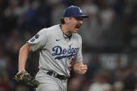 Los Angeles Dodgers pitcher Alex Vesia reacts after striking out Atlanta Braves Ozzie Albies in the fifth inning in Game 2 of baseball's National League Championship Series Sunday, Oct. 17, 2021, in Atlanta. (AP Photo/Brynn Anderson)