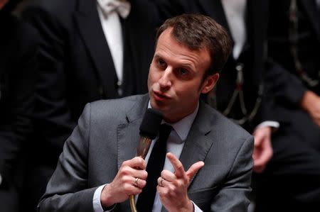 French Economy Minister Emmanuel Macron speaks during the questions to the government session at the National Assembly in Paris, France, May 3, 2016. REUTERS/Philippe Wojazer