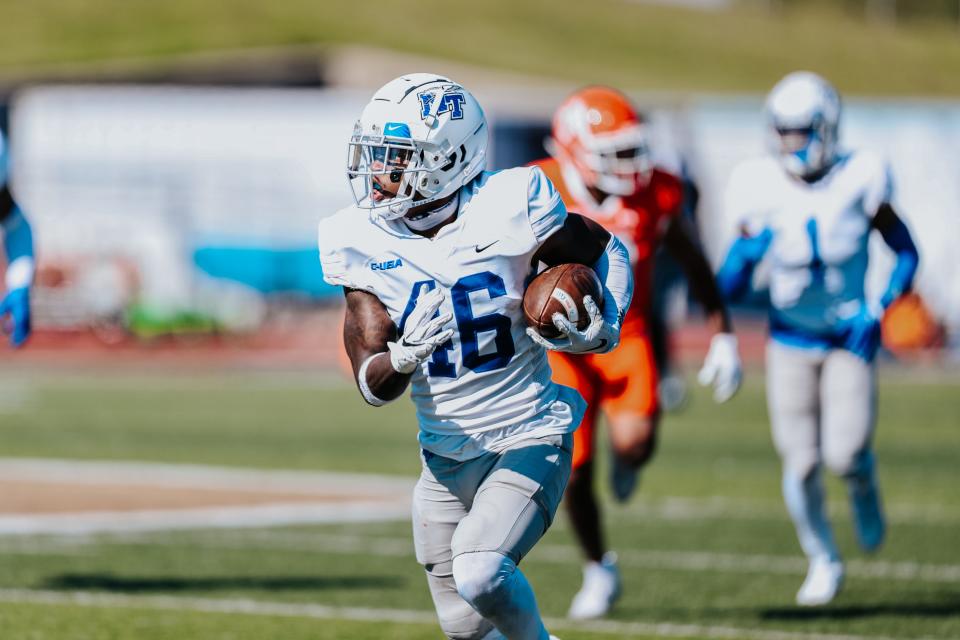 Middle Tennessee State defensive back Marvae Myers returns an interception during the third quarter of Saturday's Conference USA game and season finale at Sam Houston State