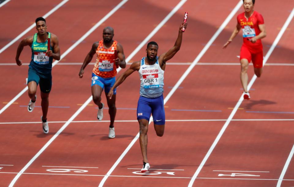 Britain's Nethaneel Mitchell-Blake celebrates winning the Men's 4x100m Relay. (Action Images via Reuters)
