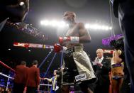 Floyd Mayweather Jr. of the U.S. arrives in the ring to face Manny Pacquiao of the Philippines in their welterweight WBO, WBC and WBA (Super) title fight in Las Vegas, Nevada, May 2, 2015. REUTERS/Steve Marcus