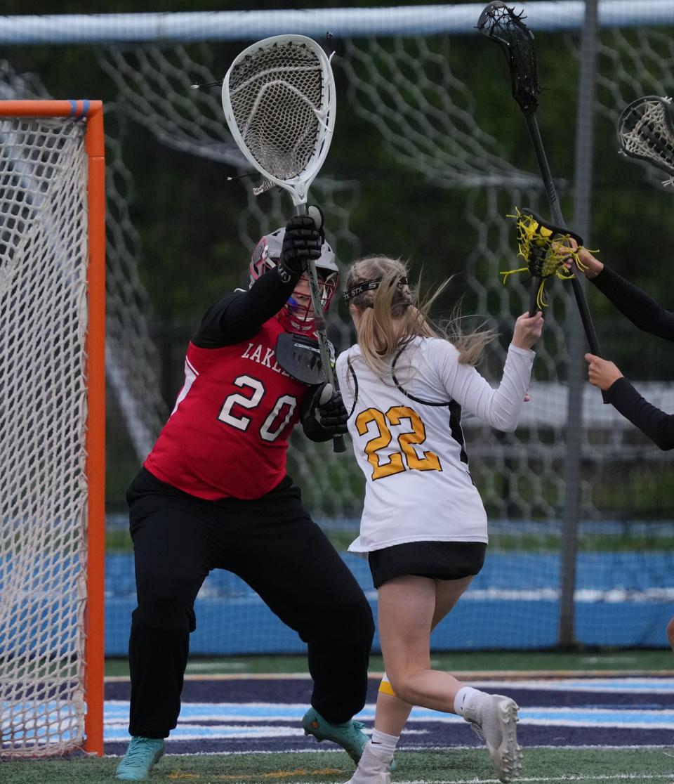 Wayne, NJ - May 3, 2023 —  Hailey Callahan of Lakeland and Kailey Maskerines of West Milford as Lakeland topped West Milford 12-7 in the Passaic County Girls Lacrosse Tournament 14-5.