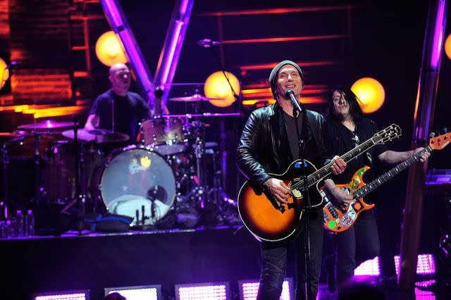 <p>Brian Killian/Getty</p> The Goo Goo Dolls perform in January 2014